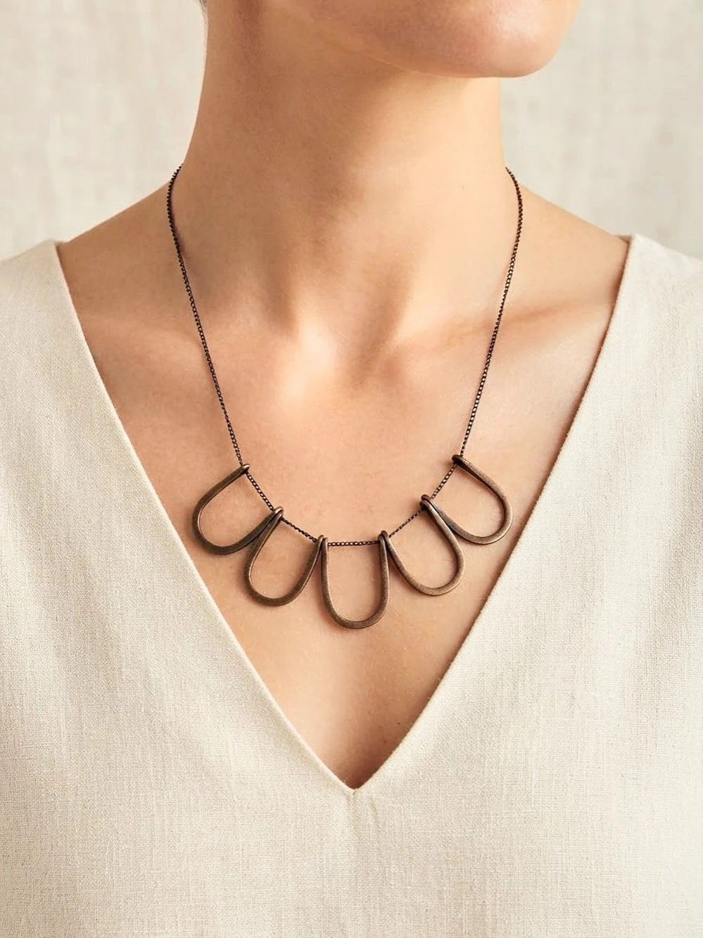 Plunder Bronze-Tone Pendant Necklace